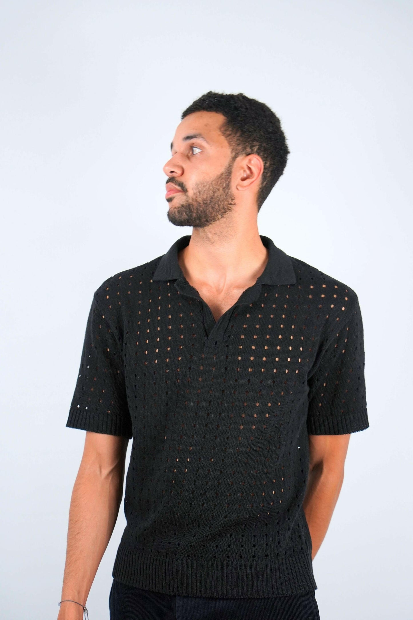 midnite polo noir ajoure maille trou homme soiree