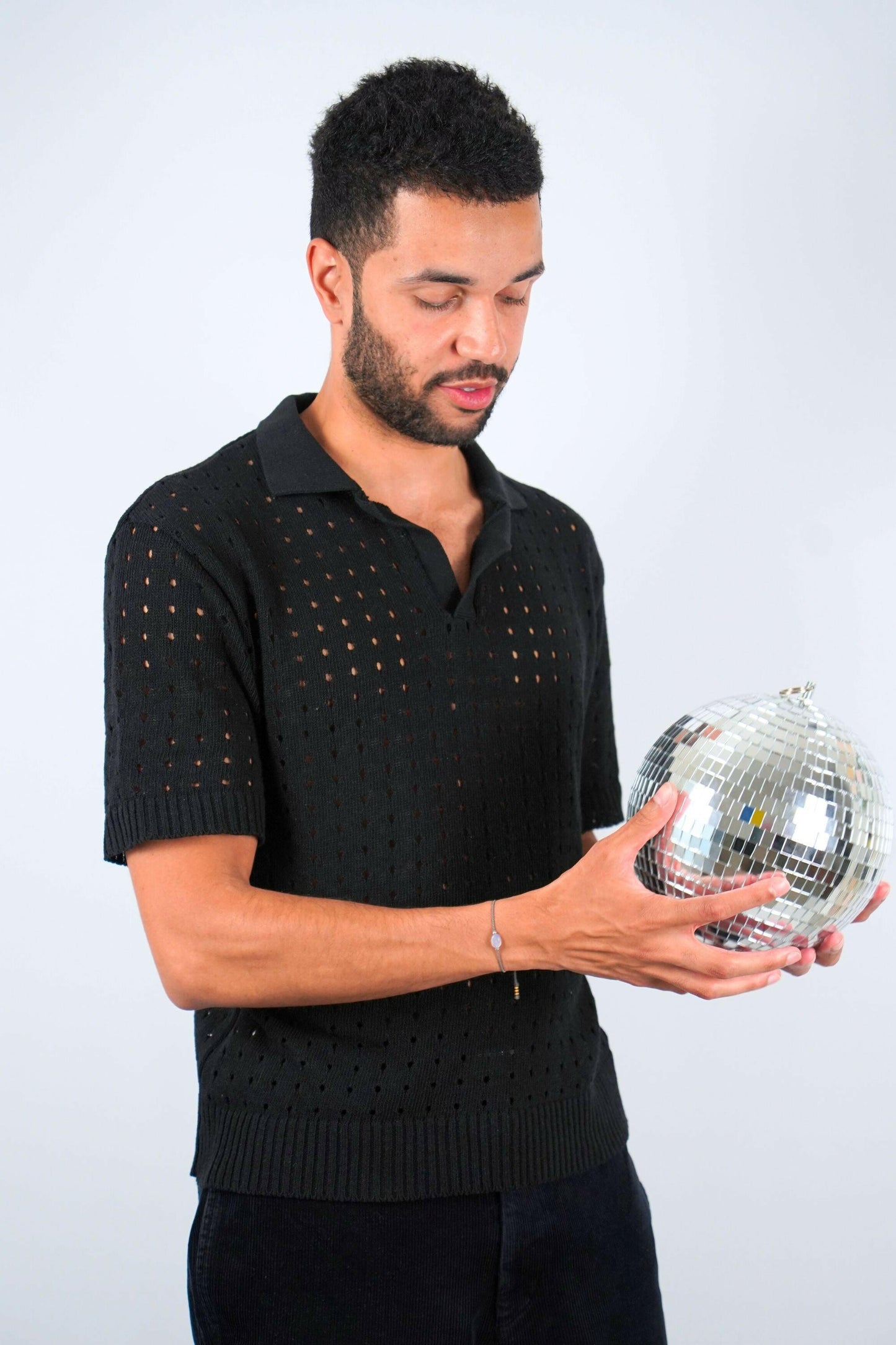 midnite polo noir ajoure maille trou homme soiree