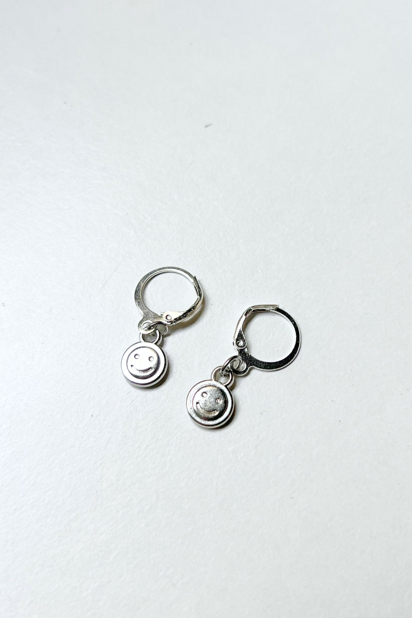 boucles d'oreilles midnite smiley techno argent acier inoxydable femme homme summer festival happy luxe