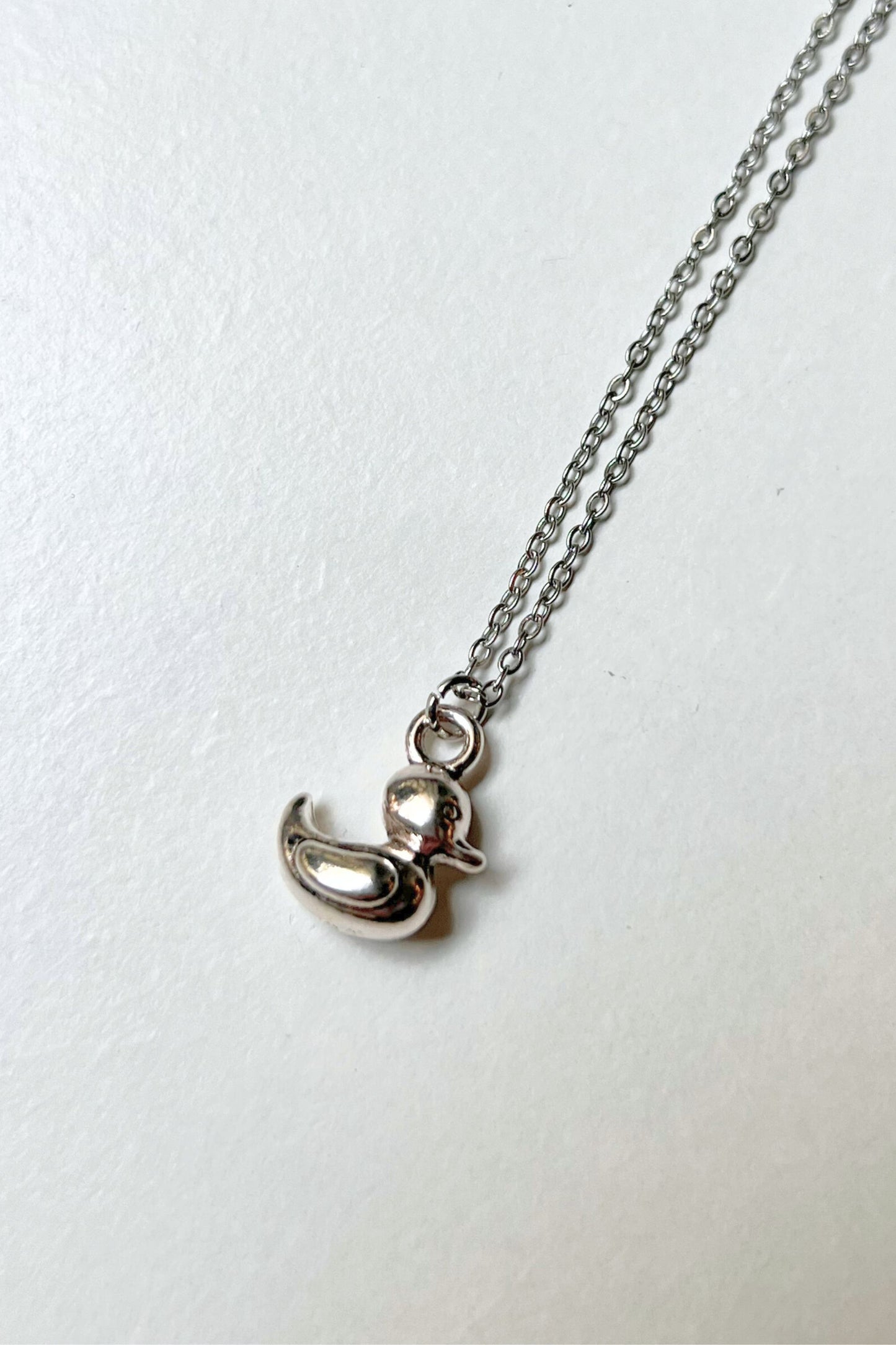 collier canard argent midnite acier inoxydable homme femme bijoux festival techno party summer ete 2026