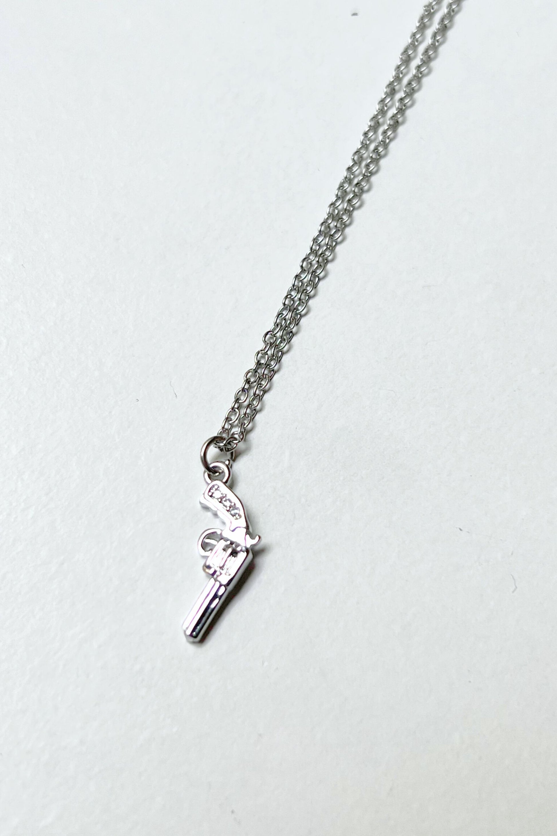 collier gun argent midnite acier inoxydable homme femme bijoux festival techno party summer ete 2026 bijoux chaine