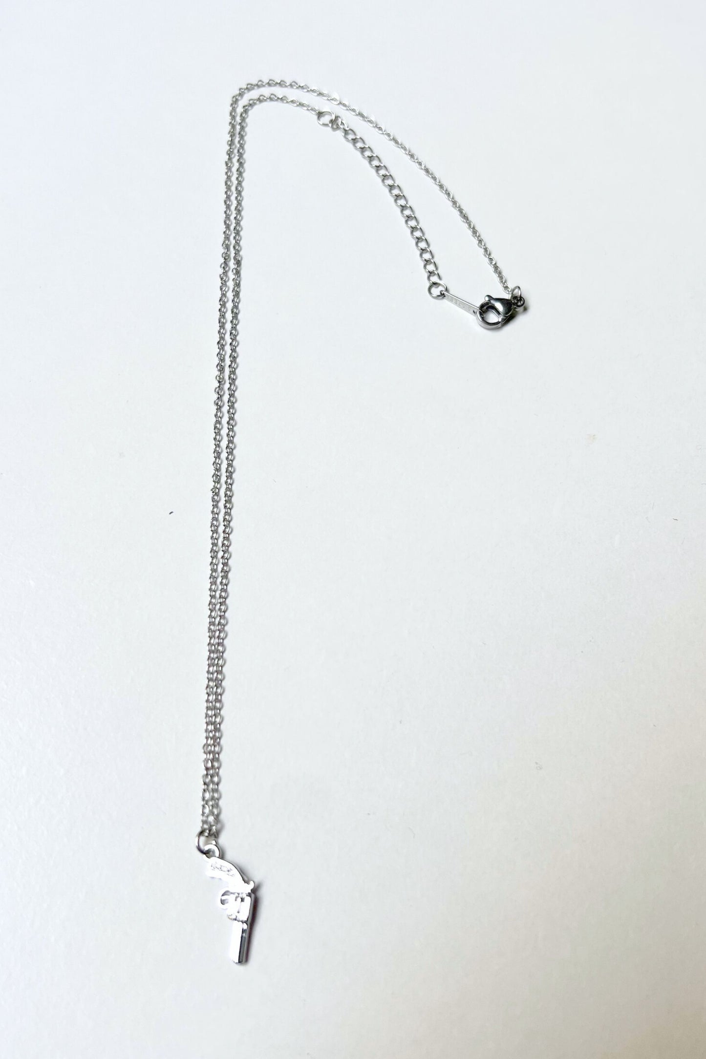 collier gun argent midnite acier inoxydable homme femme bijoux festival techno party summer ete 2026 bijoux chaine